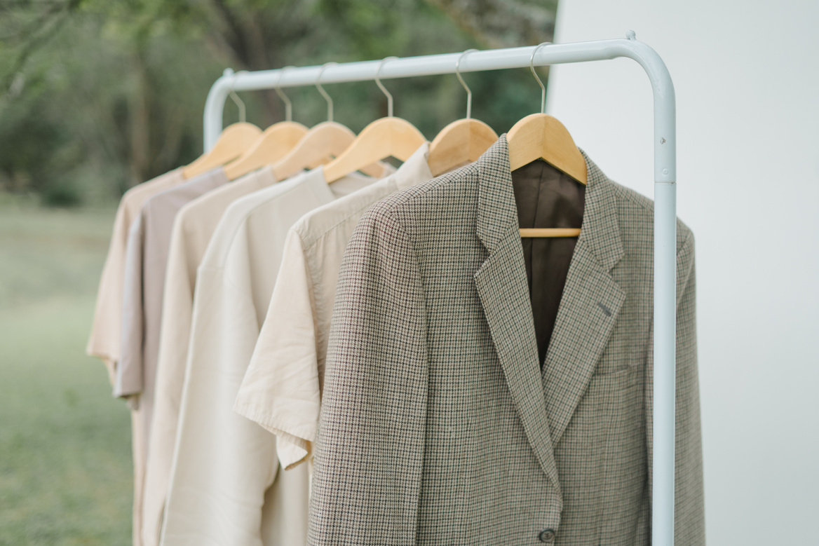 Neutral Colored Garments Hanging on a Rack